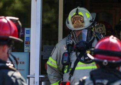 Firefighter Emerging from a Building